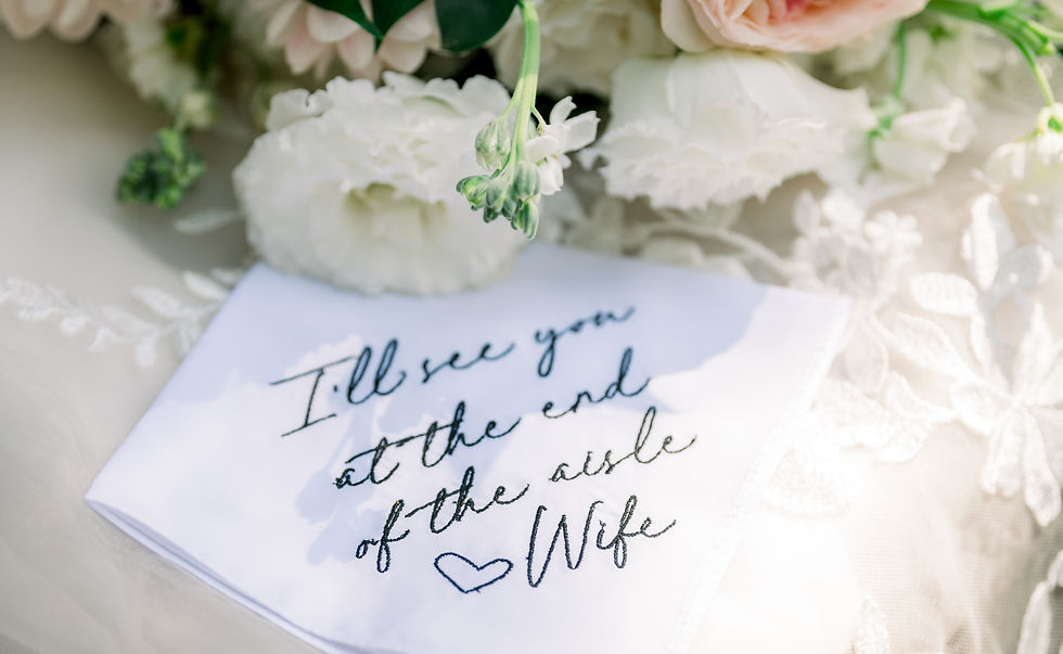 "I'll see you at the end of the aisle" handkerchief on wedding dress