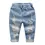 Miniatura: Pantalones vaqueros con agujeros para niños y niñas.