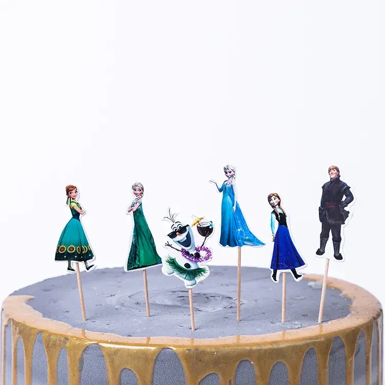 Miniatura: Palillos para cupcakes con temática de princesa Elsa y Anna de Frozen.