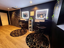 Private beauty studio with salon chair, mirror, and pro lighting for hair and makeup shoots at Creative Block ATL