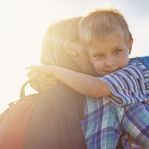 Parent hugging child