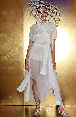 A model posing with a sustainable dress from Cosecha Vintage of Argentina