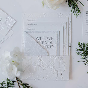 Bespoke stationery with custom embossing.