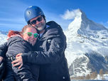 a couple enjoying a moment are posing for the camera 
