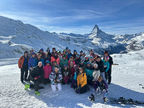 a large group of people are gathered together on a ski holiday