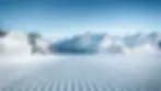 Wide angle view of the sunrise over snow-covered peaks