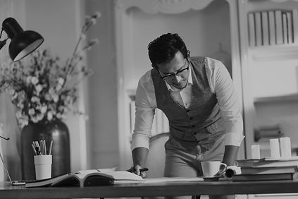 Person Looking At Document In Office_edi