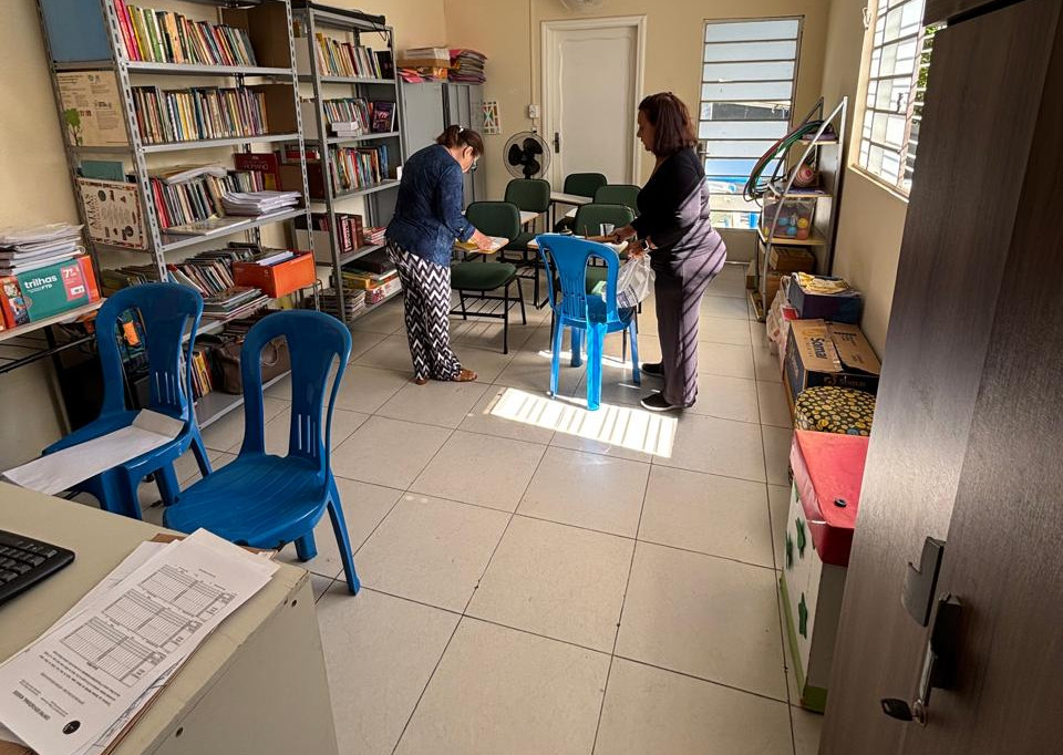 Eye-level view of school principal's office with organized desk and educational materials