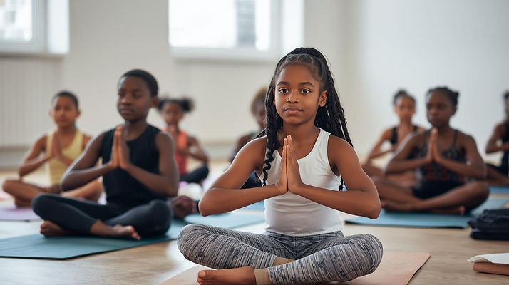 black boys and girls ata yoga studio practicing.jpg