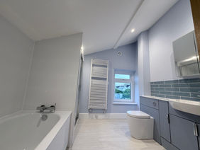 Renovated upstairs bathroom and shower room.
