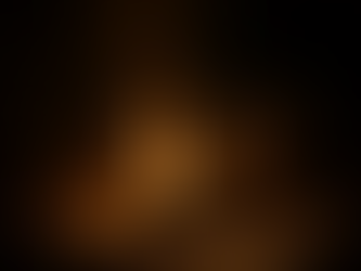 A clay oil lamp burns brightly on ancient stone, with two smaller flames glowing in the darkness behind it.