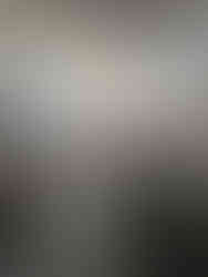 Participants raising their arms during a sound healing and somatic exercise session led by Andrea Joy Pearson at Children’s Nebraska.