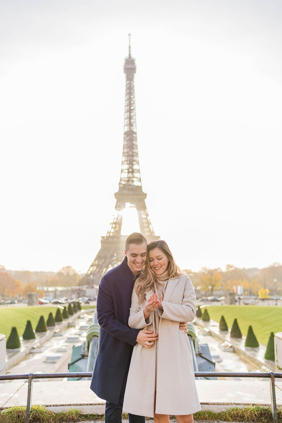 Romantic engagement photoshoot in Paris with Eiffel Tower and morning sunlight