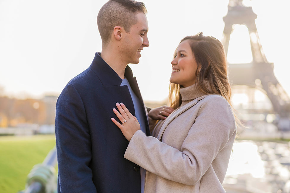 Man proposing to his girlfriend at Trocadero Gardens overlooking the Eiffel Tower