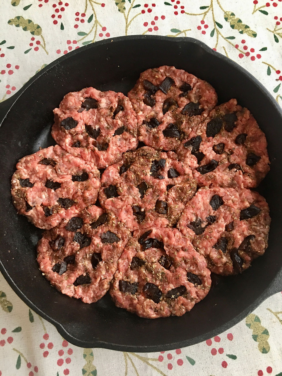 I push the dried plum pieces down into the sausage patties really well. It is good for them to be emerged so that they stay in the sausage while cooking.