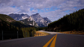 A road between Calgary and Kananaskis Provincial Park not far from each other
