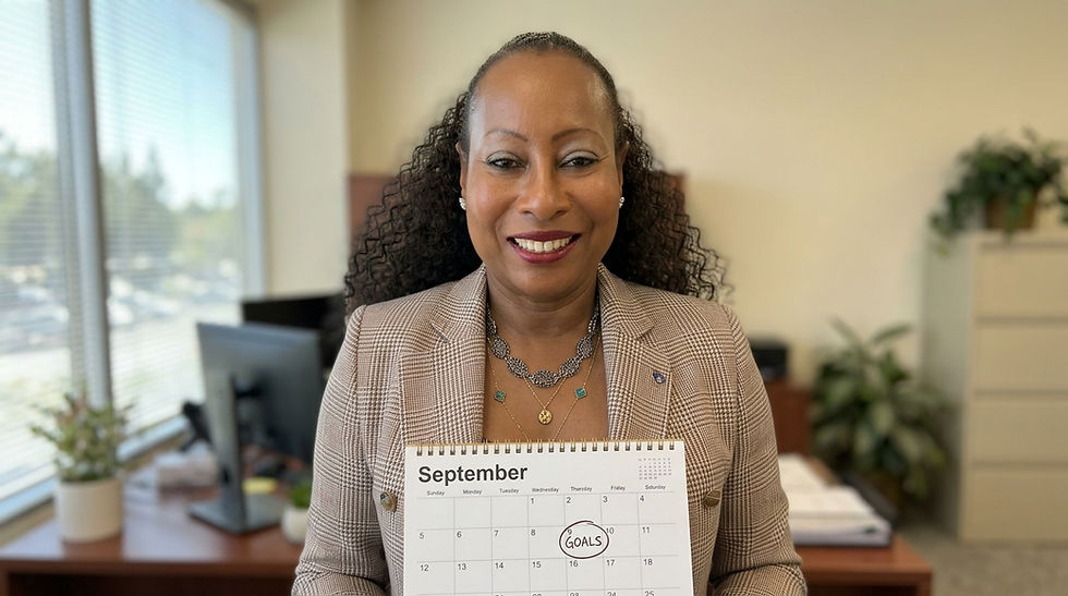 A businesswoman confidently presenting her strategic goals for September, ready to tackle the month's challenges and opportunities.