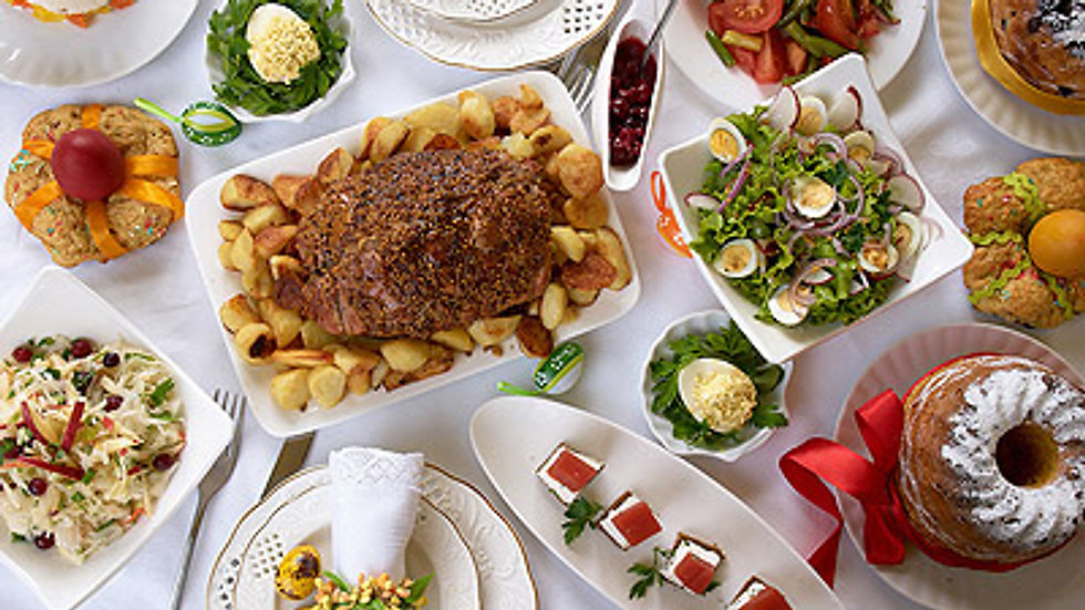 Eye-level view of a festive New Year party table with colorful appetizers and drinks