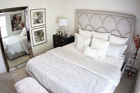 Modern bedroom interior at Springbrook Cercle offering a peaceful and well-organized living space.