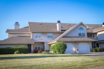 Exterior view of Springbrook Cercle showcasing modern residential design, landscaped grounds, and inviting community atmosphere.