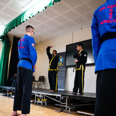 nstructors showing Choi Kwang Do techniques to students during class in Edgware Choi Kwang Do.