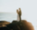 woman and man standing on brown rock formation during daytime_edited.jpg