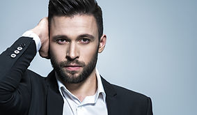 handsome-man-black-suit-with-white-shirt-posing-attractive-guy-with-fashion-hairstyle-conf