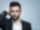 handsome-man-black-suit-with-white-shirt-posing-attractive-guy-with-fashion-hairstyle-conf