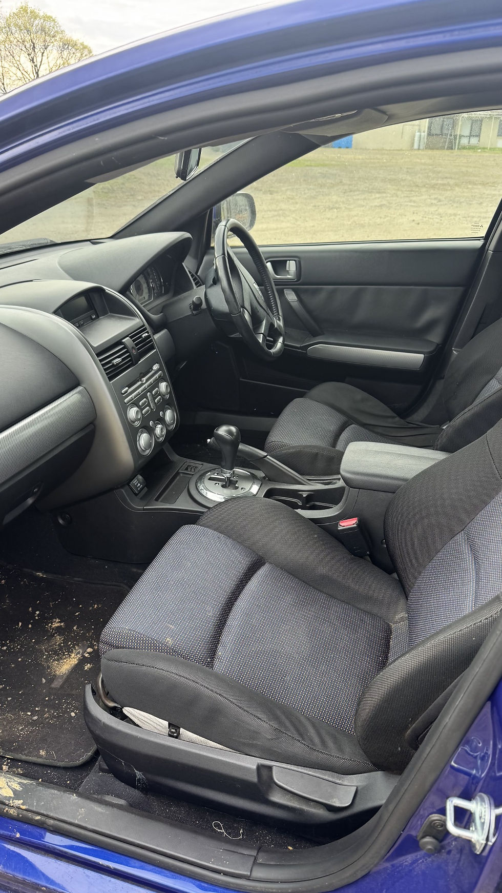 Blue Mitsubishi 380 donor - front interior