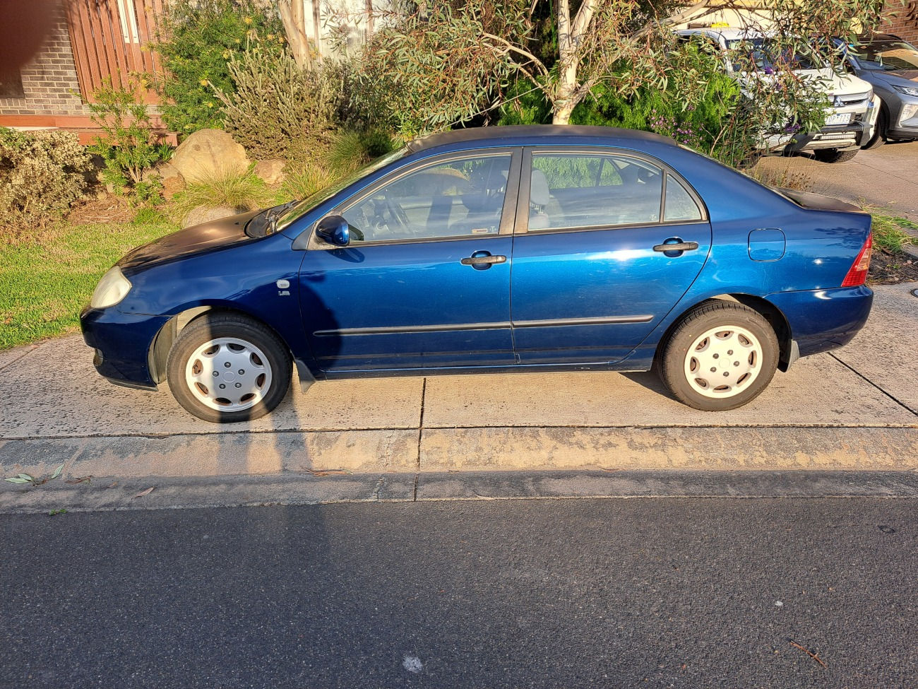 2005 Toyota Corolla Ascent sedan donor - passenger side