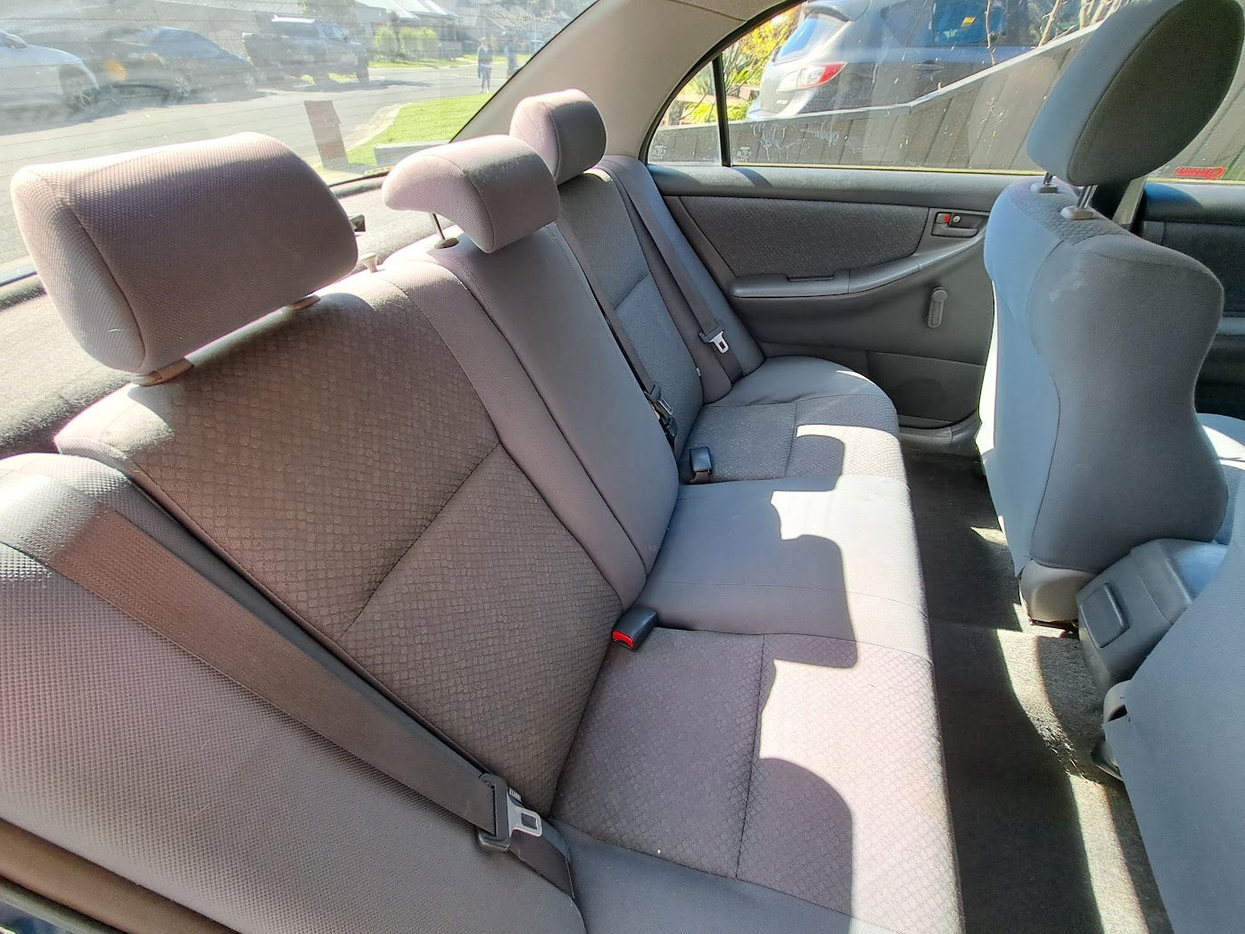 2005 Toyota Corolla Ascent sedan donor - rear interior