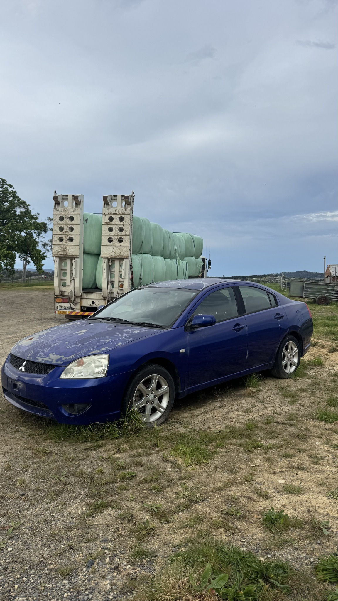 Blue Mitsubishi 380 donor - left front