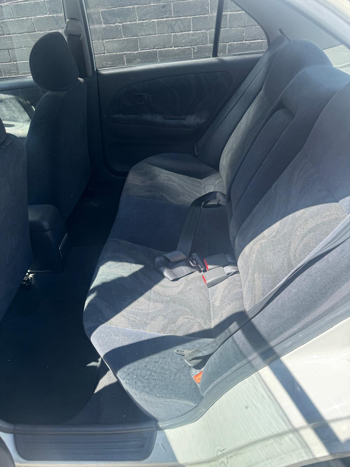 1999 Lancer CE white sedan - Rear Cloth Seat Assembly - photo 1