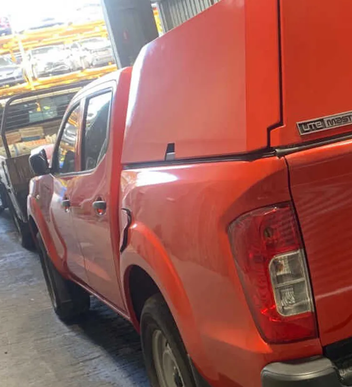 2022 Nissan Navara D23 Left Front Guard Red AX6 — donor vehicle image 2
