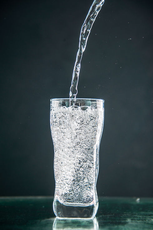 front-view-glass-soda-getting-poured-dark-drink-photo-champagne-xmas-water.jpg