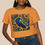 Thumbnail: Yellow crop top with raven folk art on person view