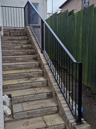 Black metal staircase railing