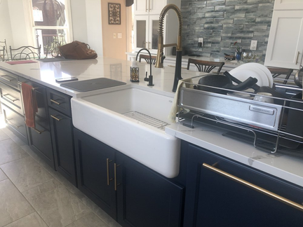 Custom Cabinetry in White Shaker with Navy Blue Island & Quartz Countertops 