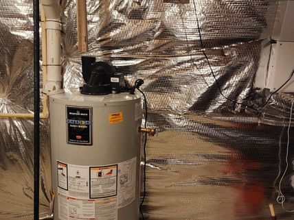 Existing water heater before plumbing replacement work in Northern Virginia.