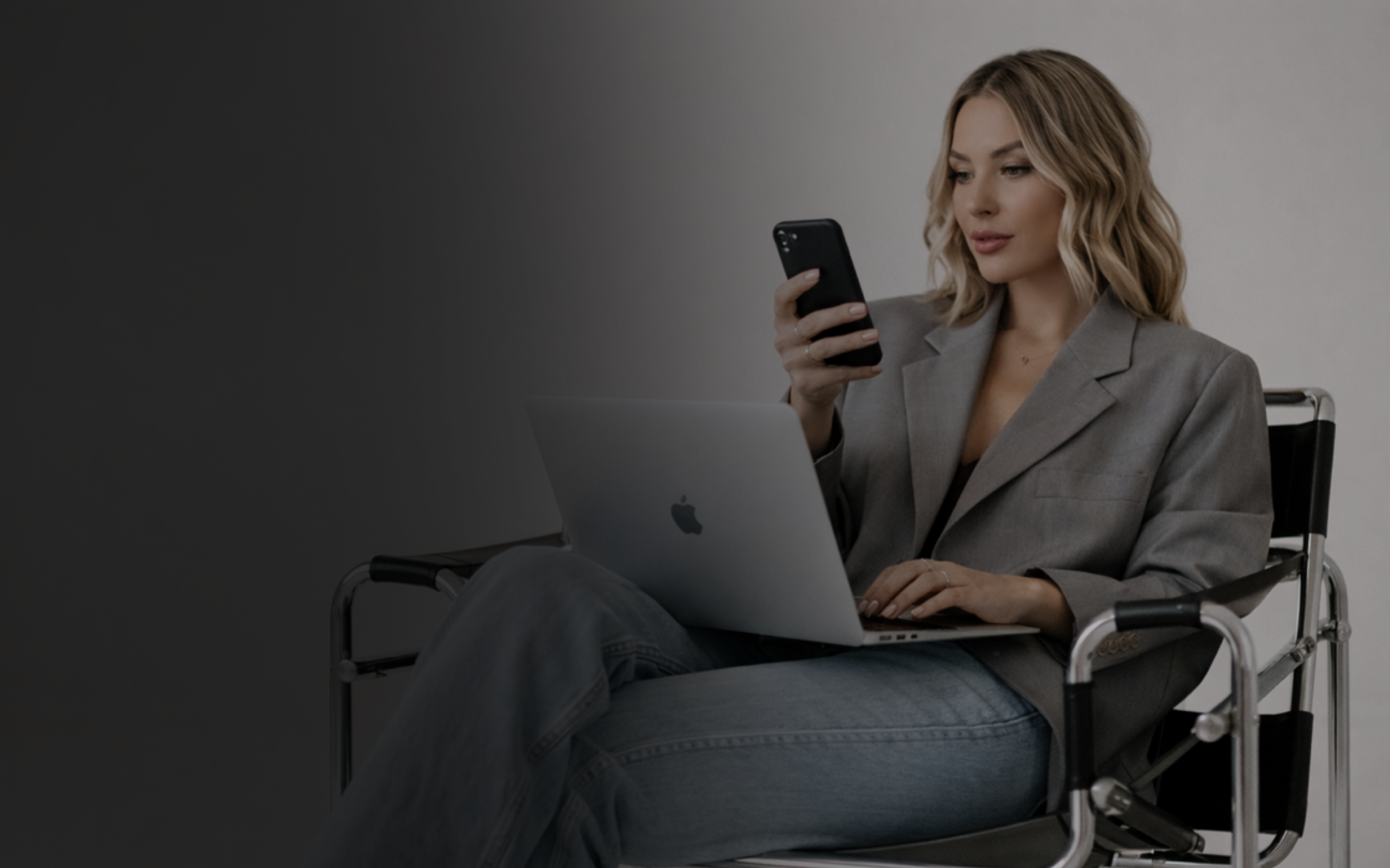 Salon owner checking her phone