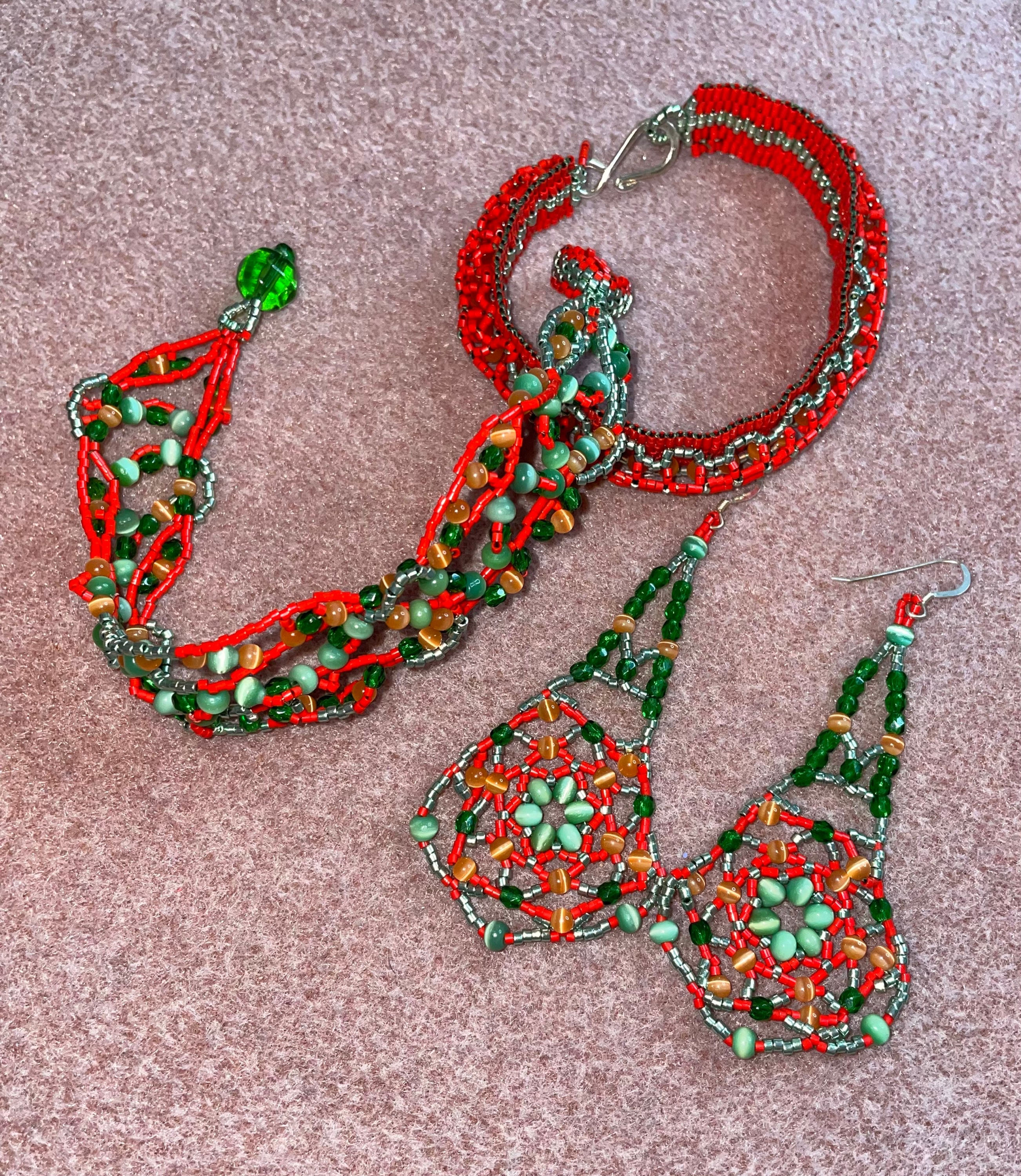 Two bracelets with earrings.