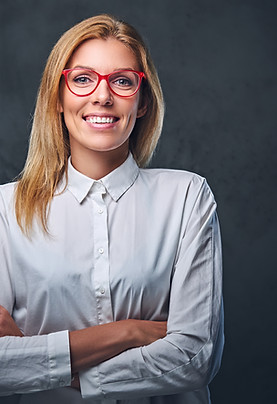 attractive-blond-business-woman-white-shirt-eyeglasses-crossed-arms-grey-background.jpg