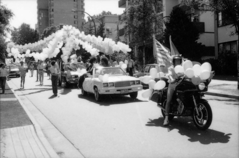 Pride Parade 1985 #1: Dykes on Bikes lead the parade through Vancouver’s West End, 1985. (Photographer unknown.)