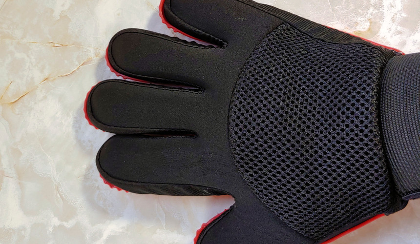 Awinner Pet grooming glove worn with the fabric side up