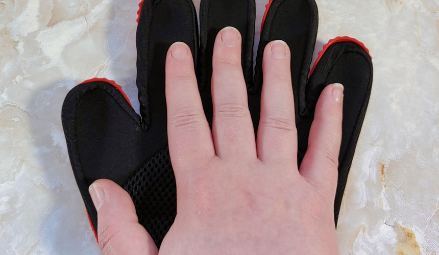 Awinner Pet grooming glove is compared to a medium hand size