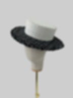 woman's designer white and black boater hat