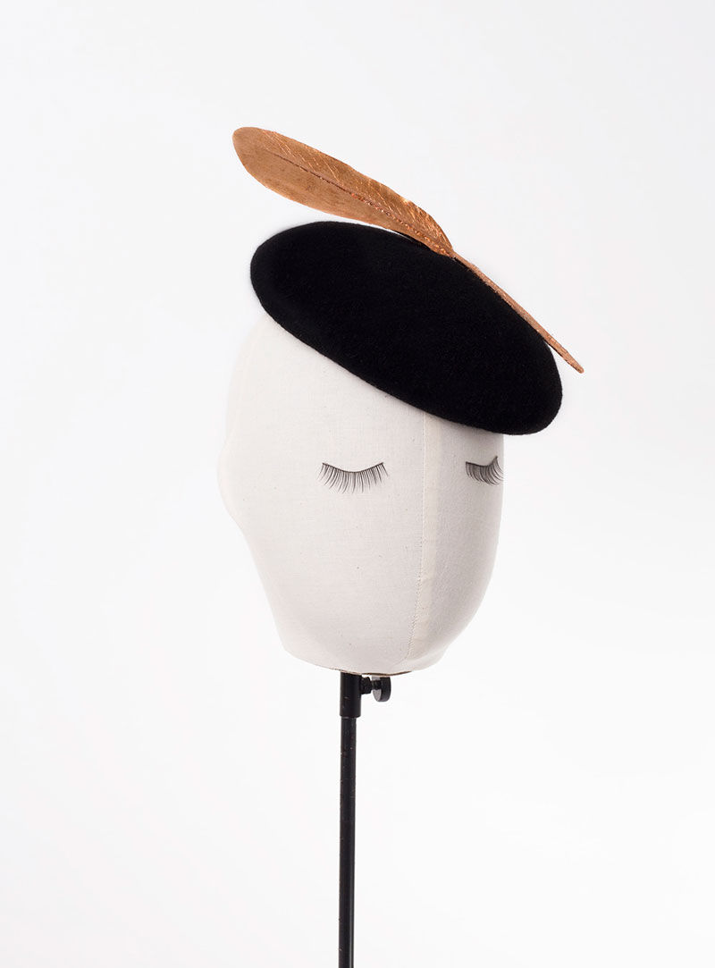 Thumbnail: black designer beret hat with gold feather London