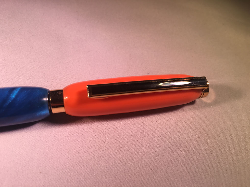 orange and blue pen top half