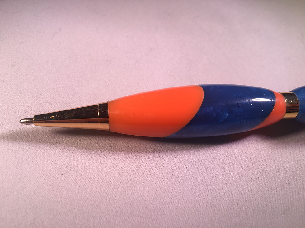 orange and blue pen bottom half