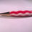 Thumbnail: red white and blue pen